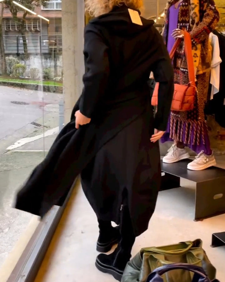 Elevate Your Style with the Black Midi Dress Featuring Convenient Pockets
