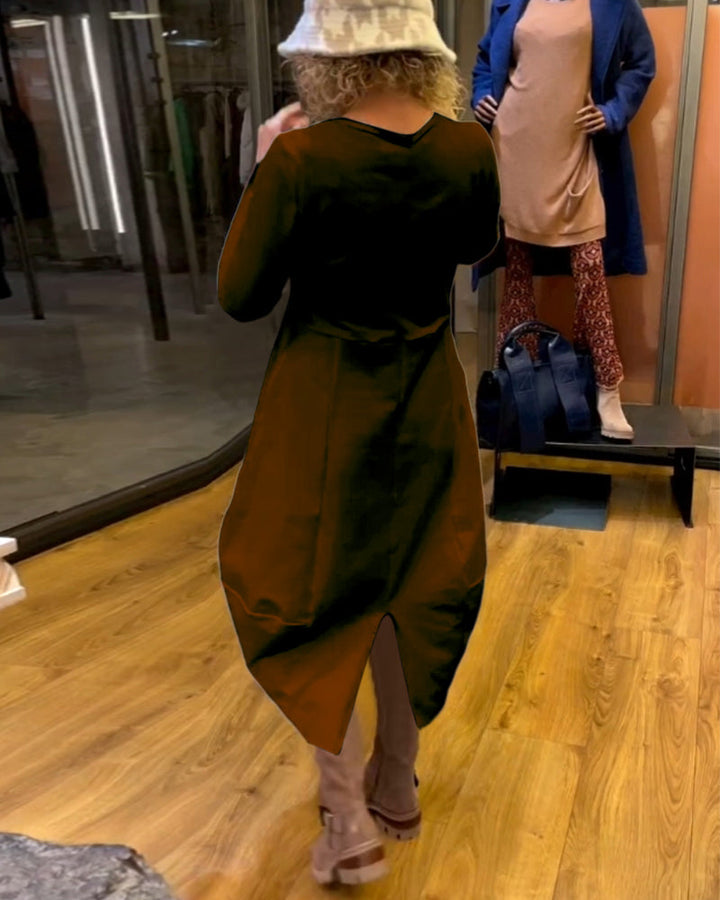 Elevate Your Style with the Black Midi Dress Featuring Convenient Pockets