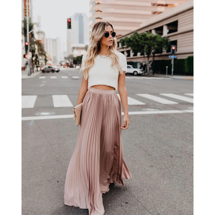 Timeless Elegance with a Flowing Pleated Skirt