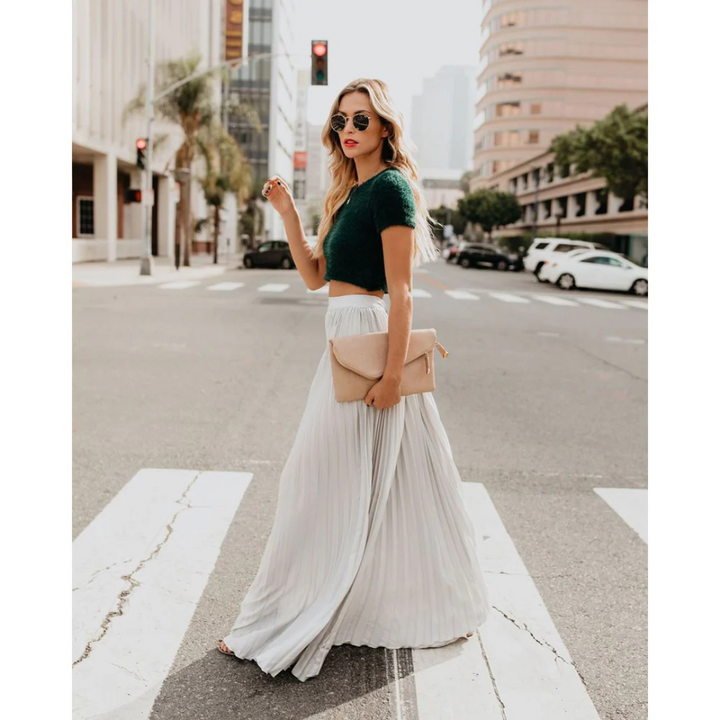 Timeless Elegance with a Flowing Pleated Skirt
