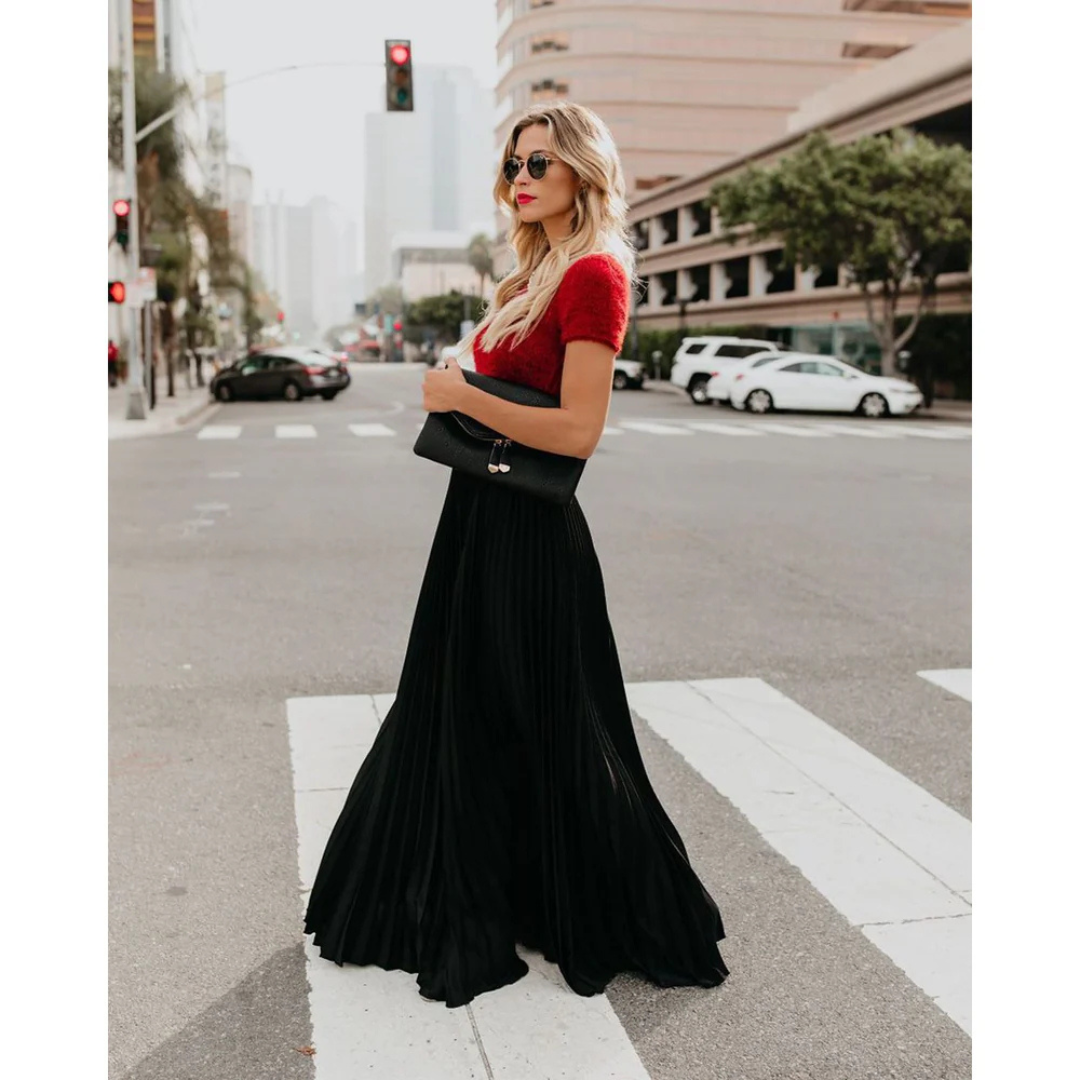 Timeless Elegance with a Flowing Pleated Skirt