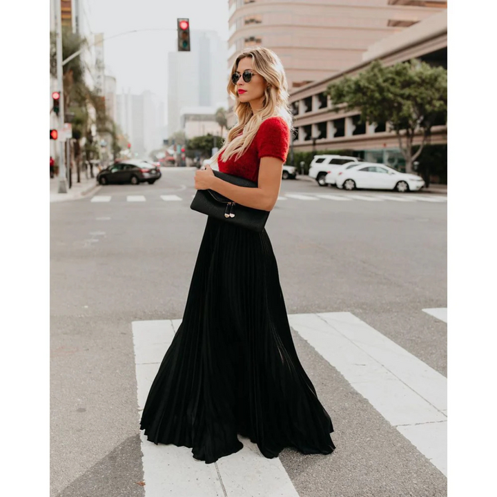 Timeless Elegance with a Flowing Pleated Skirt