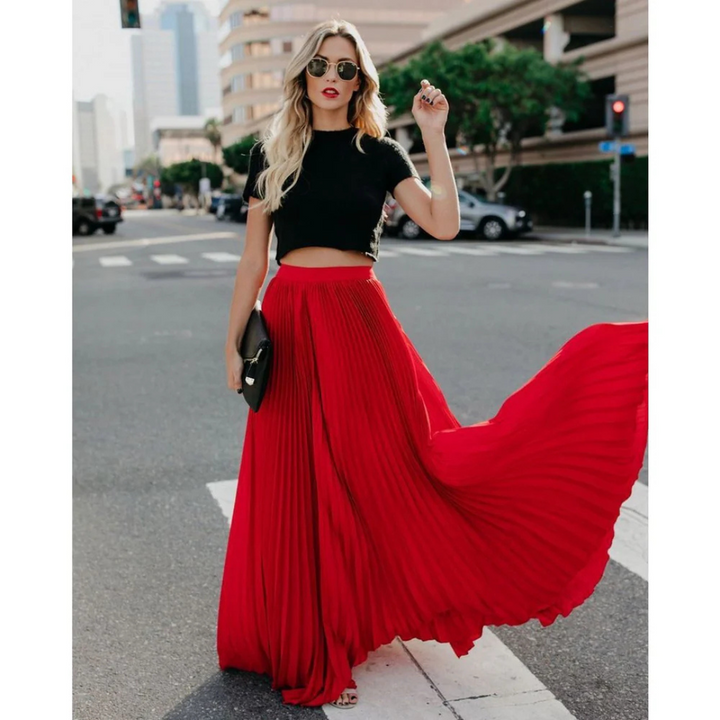 Timeless Elegance with a Flowing Pleated Skirt