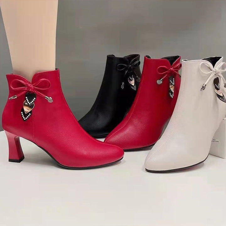 Chic Suede Ankle Boots Featuring a Stylish Bow