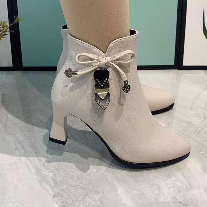 Chic Suede Ankle Boots Featuring a Stylish Bow