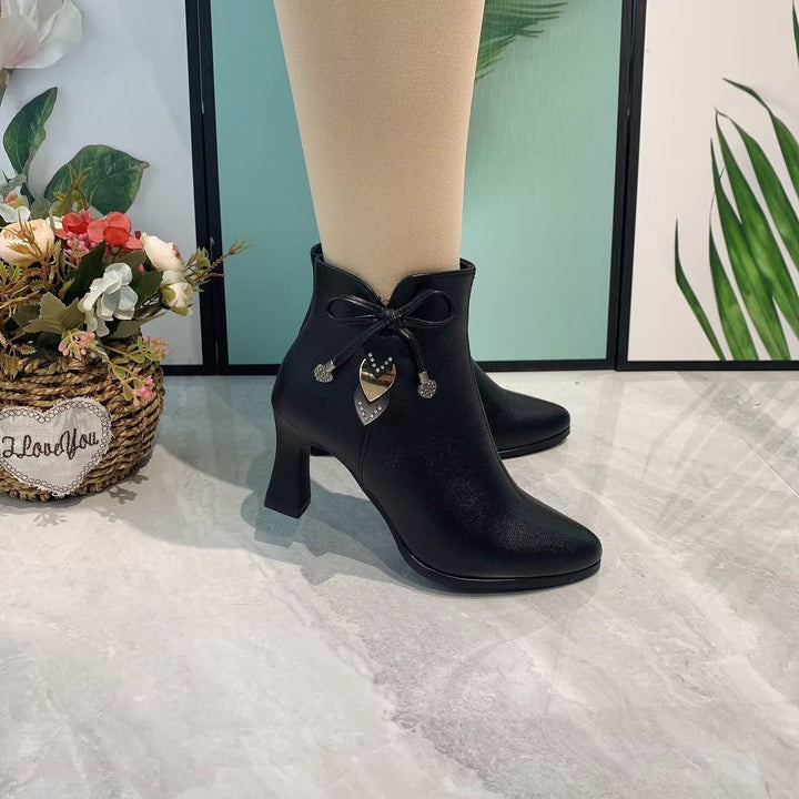 Chic Suede Ankle Boots Featuring a Stylish Bow