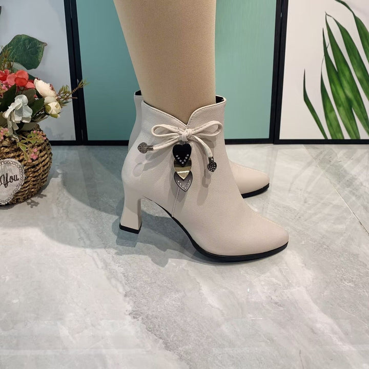 Chic Suede Ankle Boots Featuring a Stylish Bow