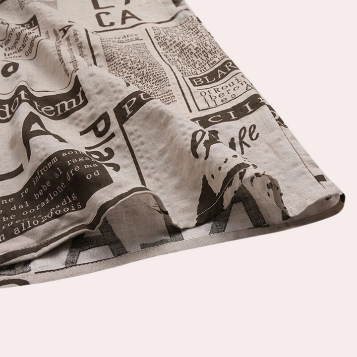 Stylish Men's Shirt Featuring a Distinctive Newspaper Print Design