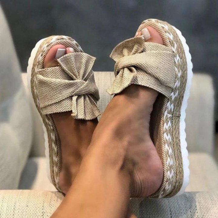 Elegantly Designed Women's Sandals Featuring a Trendy Bow Accent
