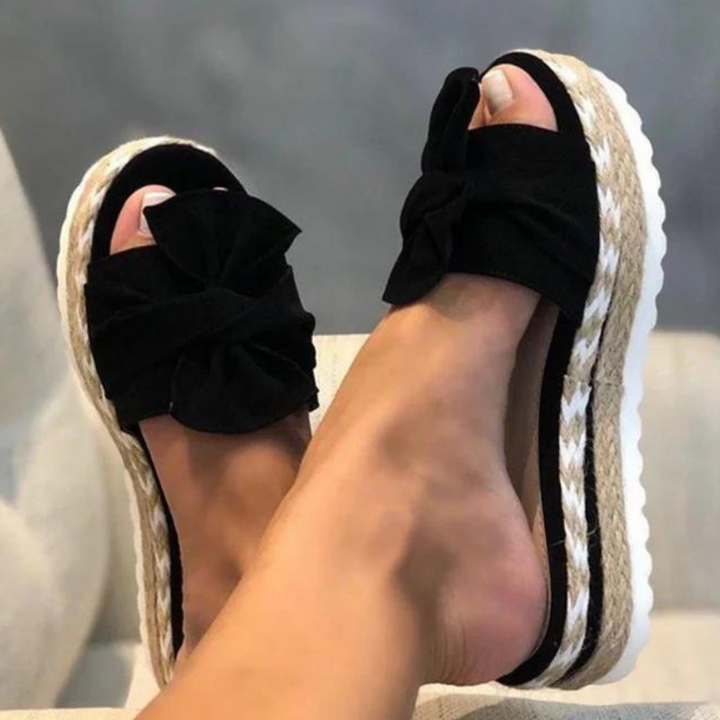 Elegantly Designed Women's Sandals Featuring a Trendy Bow Accent