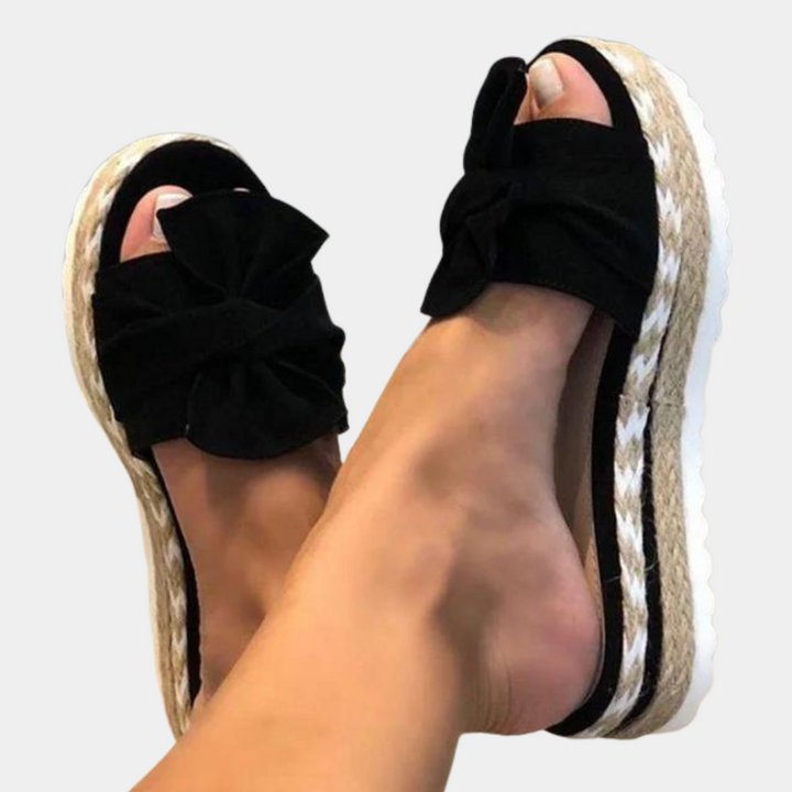 Elegantly Designed Women's Sandals Featuring a Trendy Bow Accent