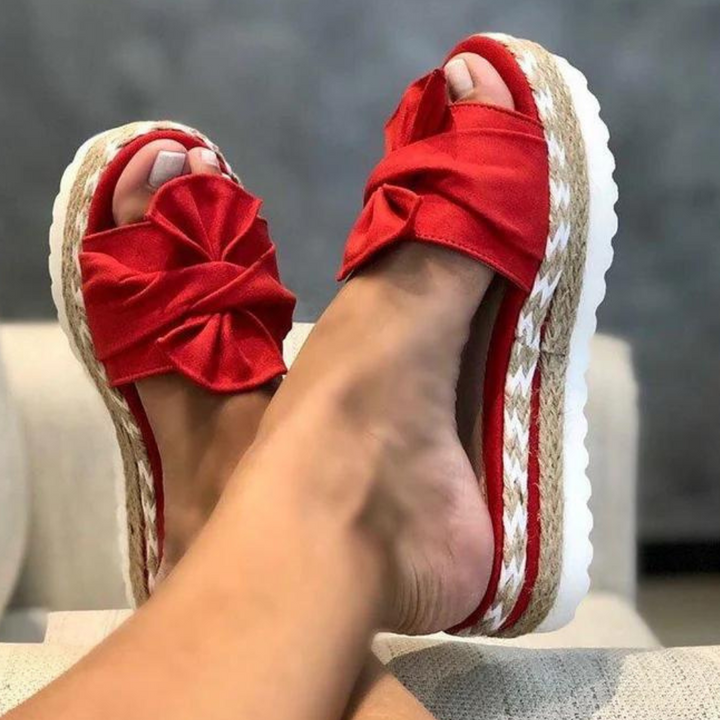 Elegantly Designed Women's Sandals Featuring a Trendy Bow Accent
