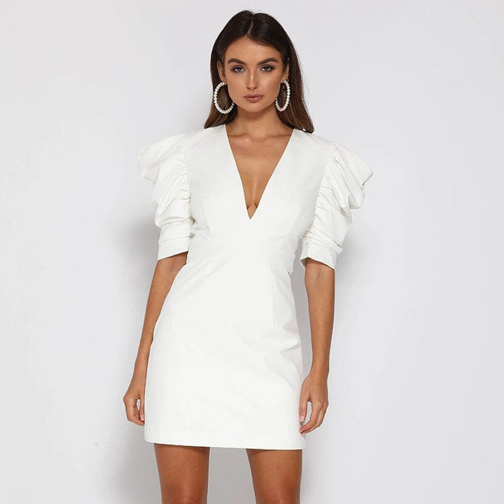 Adorable Mini Dress Featuring Trendy Puffed Sleeves