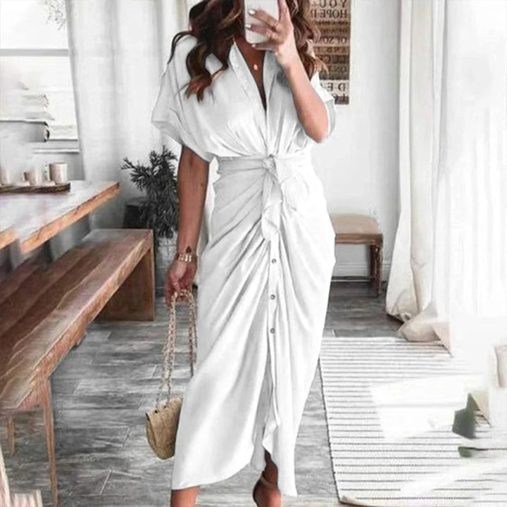 Elevate your summer wardrobe with this chic long dress.