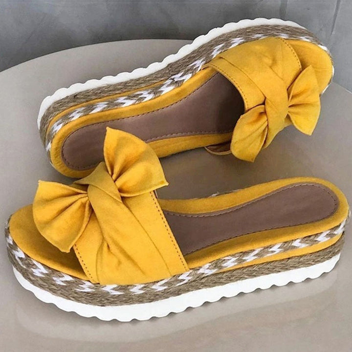 Chic and Trendy Tie-Up Sandals by Clossi