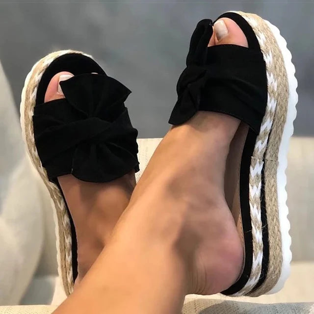Trendy sandals adorned with delightful bows