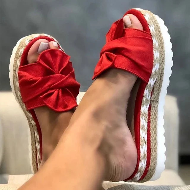 Trendy sandals adorned with delightful bows