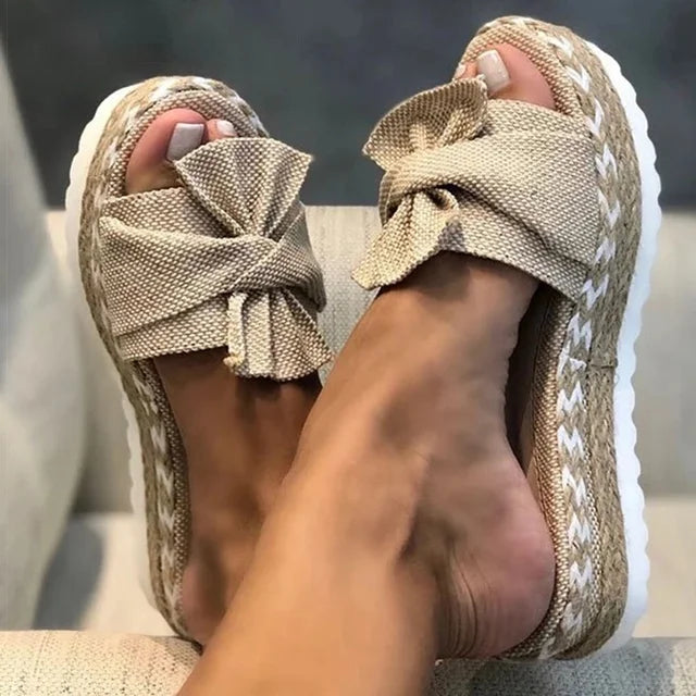 Trendy sandals adorned with delightful bows