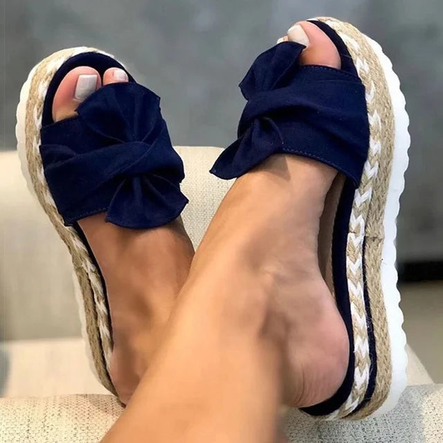 Trendy sandals adorned with delightful bows