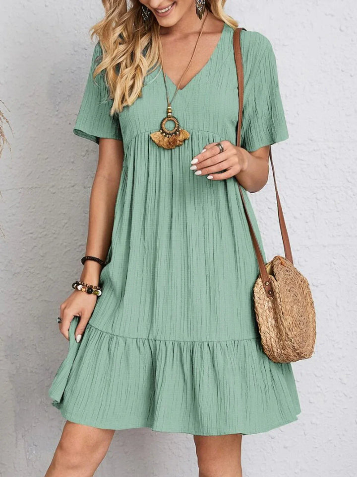 Chic Dress with Stylish Belly Concealment