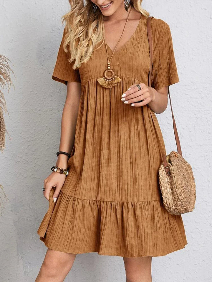 Chic Dress with Stylish Belly Concealment
