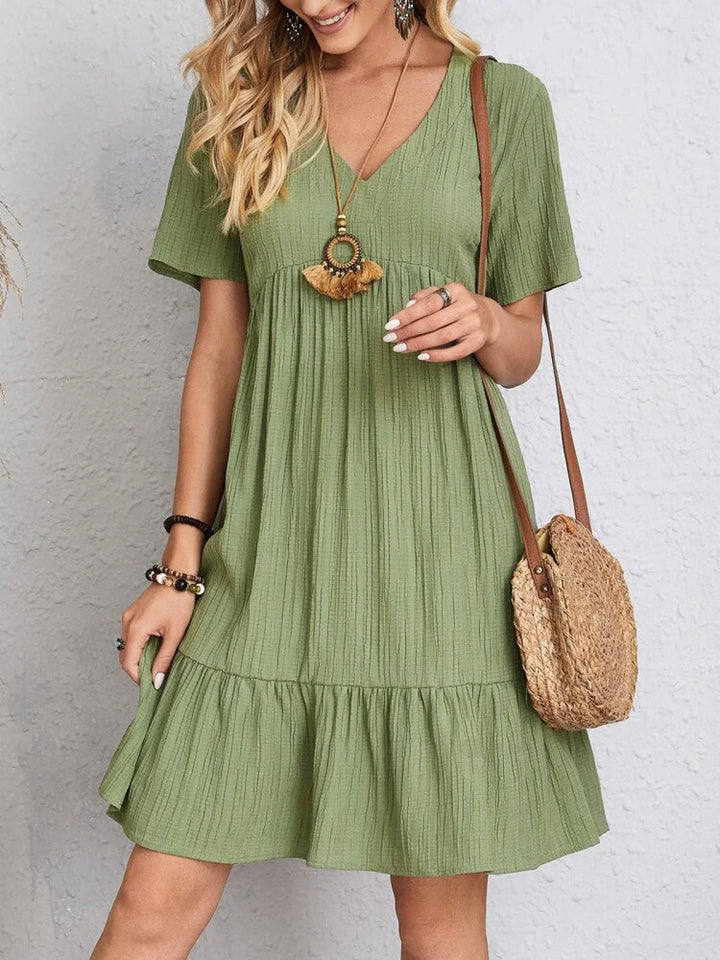 Chic Dress with Stylish Belly Concealment
