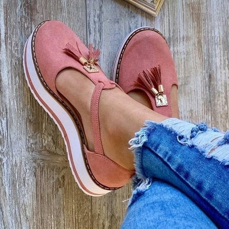 Stylish loafer sandals adorned with elegant tassels