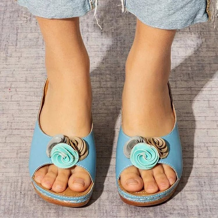 Chic Orthopaedic Leather Sandals with Stylish Floral Accents and Cozy Wedge Heel