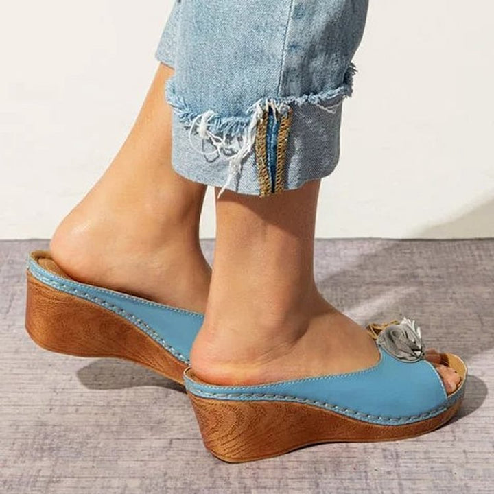 Chic Orthopaedic Leather Sandals with Stylish Floral Accents and Cozy Wedge Heel
