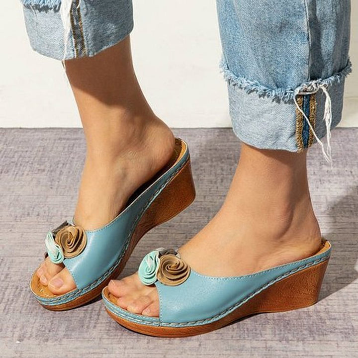 Chic Orthopaedic Leather Sandals with Stylish Floral Accents and Cozy Wedge Heel