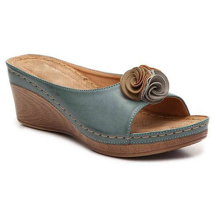 Chic Orthopaedic Leather Sandals with Stylish Floral Accents and Cozy Wedge Heel